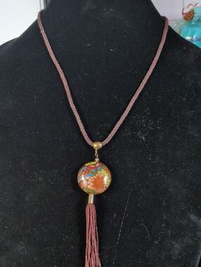 Brown Cloisenae Puff Pendant Tassel Necklace with Floral Design.